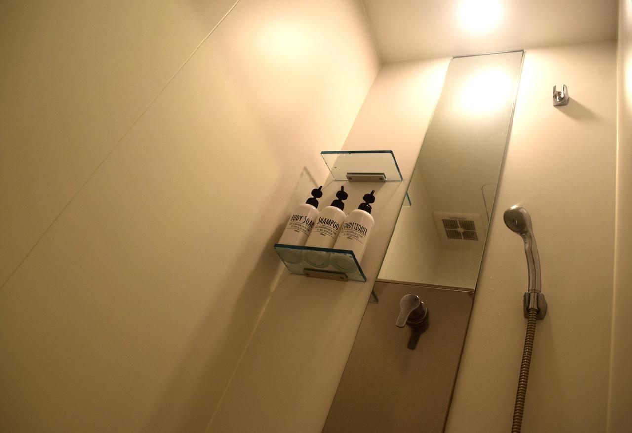 Guest House Golden Mile Hostel Amami Bagian luar foto