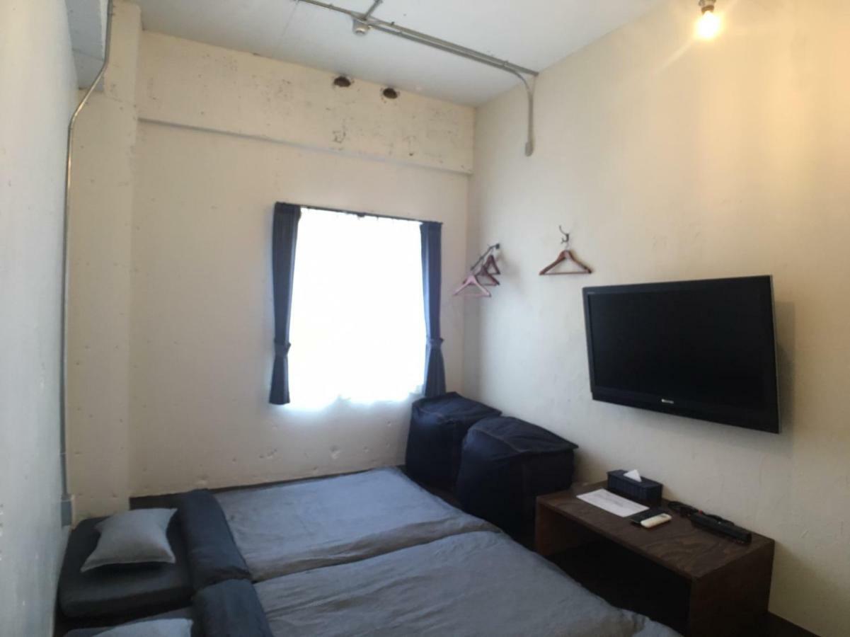 Guest House Golden Mile Hostel Amami Bagian luar foto