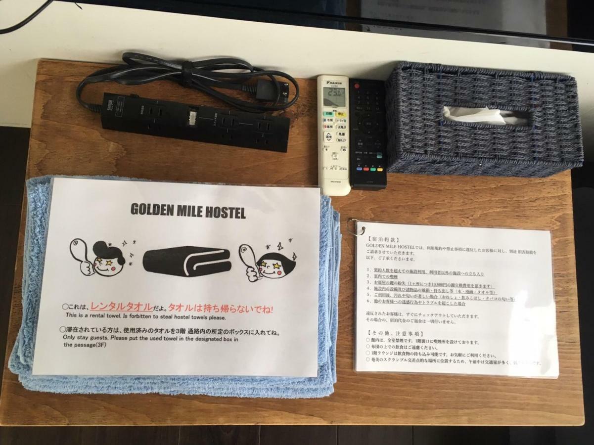Guest House Golden Mile Hostel Amami Bagian luar foto
