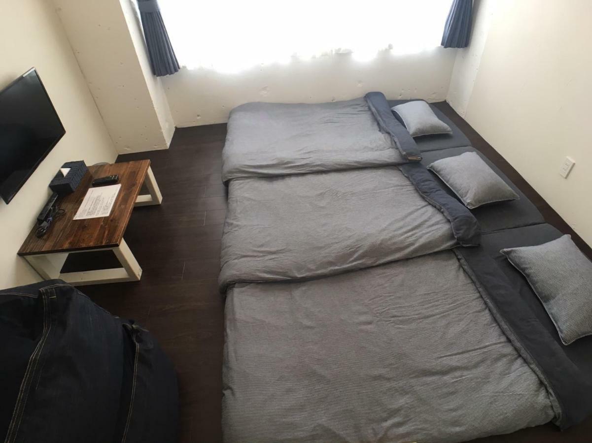 Guest House Golden Mile Hostel Amami Bagian luar foto