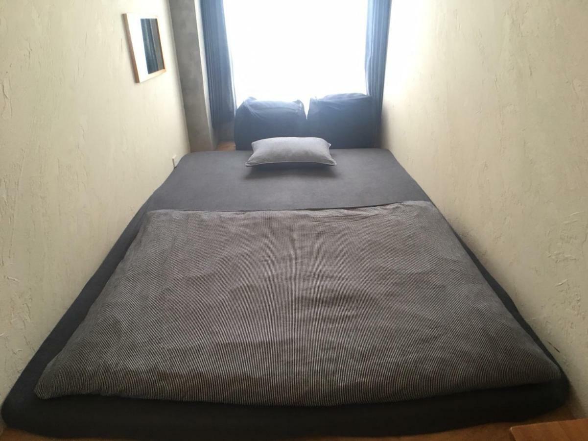 Guest House Golden Mile Hostel Amami Bagian luar foto