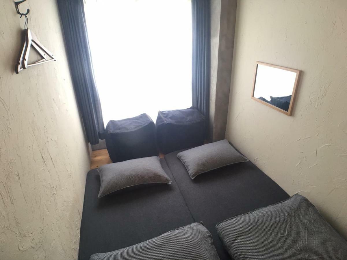 Guest House Golden Mile Hostel Amami Bagian luar foto